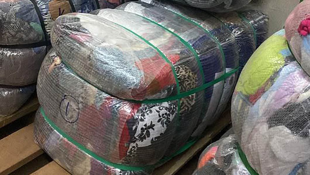 Bales of Paul’s Second-hand Clothes